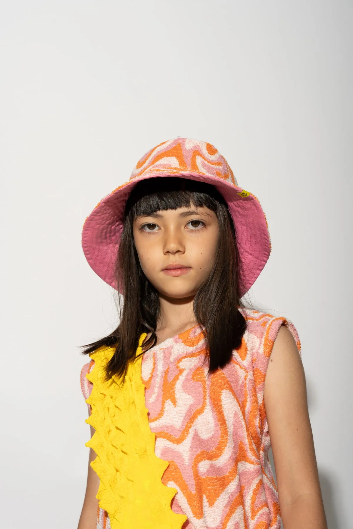 TERRY WAVY PRINT REVERSIBLE BUCKET HAT